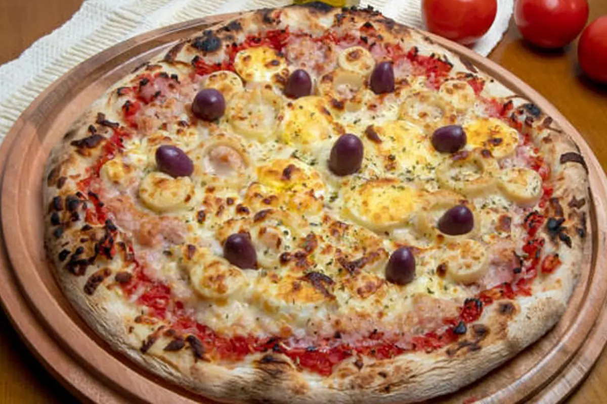 Você está visualizando atualmente Pizza portuguesa essa receita que eu preparei ficou muito boa