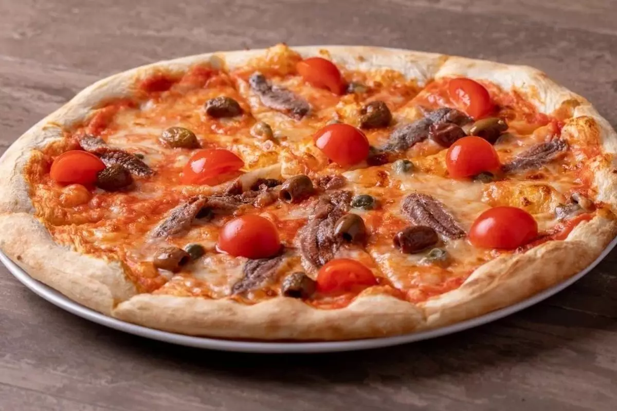 Você está visualizando atualmente Pizza de sardinha essa é uma das receitas que mais amo preparar